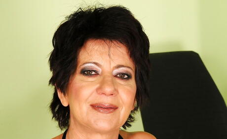 Sultry dark hair granny Katala bares small tits and sexy ass 